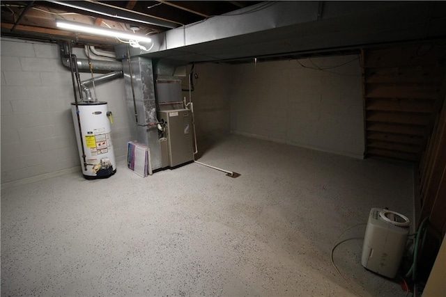 3116 Mcclellan Dr, Unity Twp, PA 15601 - unfinished below grade area with water heater, heating unit, and concrete block wall