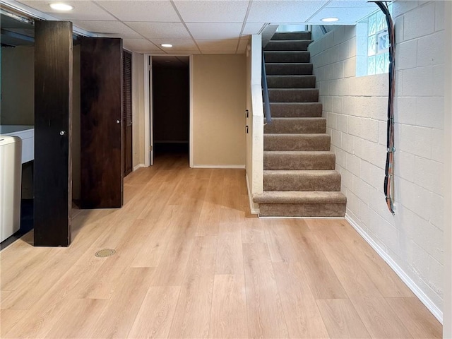 1138 Oakmont Ave, Oakmont, PA 15139 - below grade area with baseboards, recessed lighting, stairway, light wood-style floors, and concrete block wall