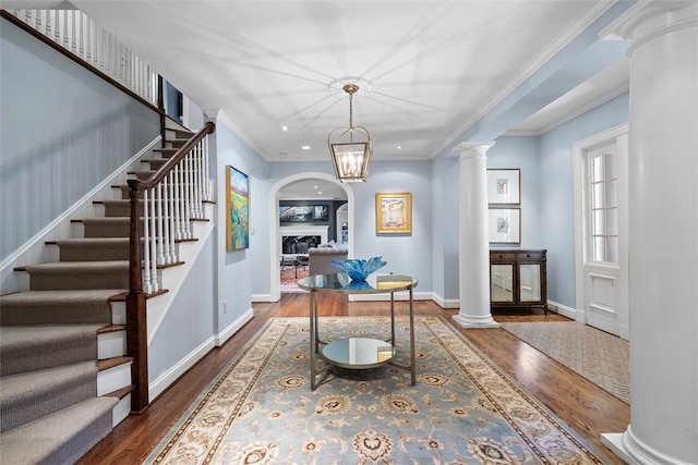 210 Creek Dr, Edgeworth, PA 15143 - corridor with wood finished floors, arched walkways, stairway, recessed lighting, and baseboards