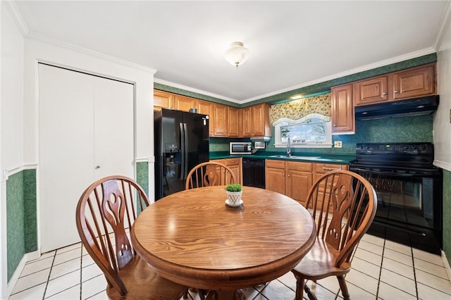5000 Holly Ct, Murrysville, PA 15668 - kitchen with under cabinet range hood, light tile patterned floors, a sink, and black appliances
