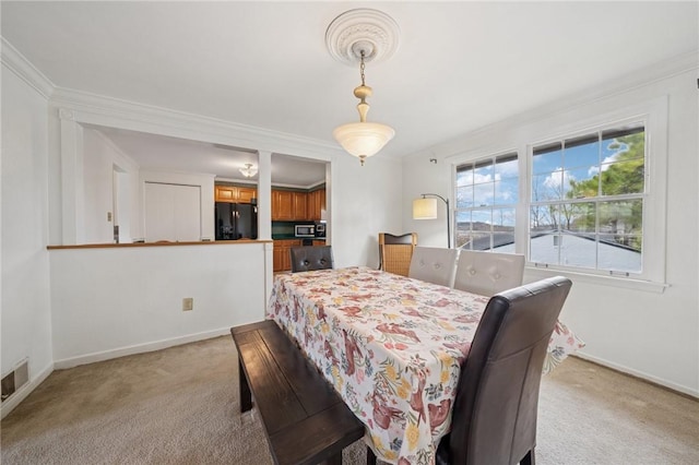 5000 Holly Ct, Murrysville, PA 15668 - dining area with light carpet, visible vents, and baseboards