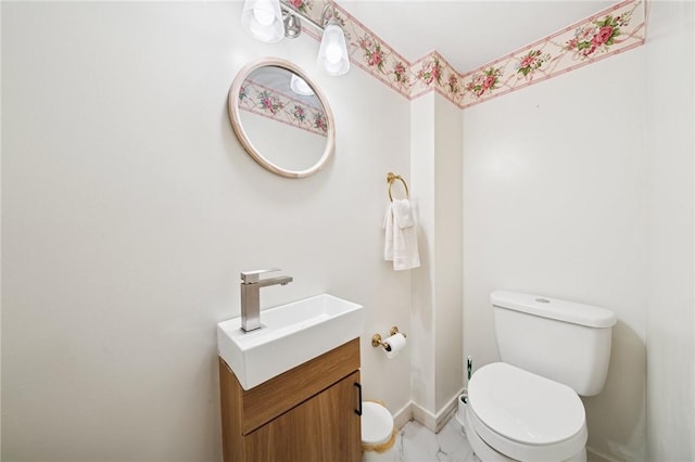 5000 Holly Ct, Murrysville, PA 15668 - bathroom featuring toilet, marble finish floor, vanity, and baseboards
