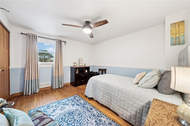 5000 Holly Ct, Murrysville, PA 15668 - bedroom featuring wood-type flooring, baseboards, a ceiling fan, and a closet