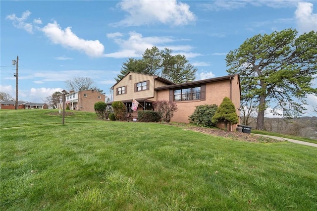 5000 Holly Ct, Murrysville, PA 15668 - view of front of home with a front lawn and brick siding