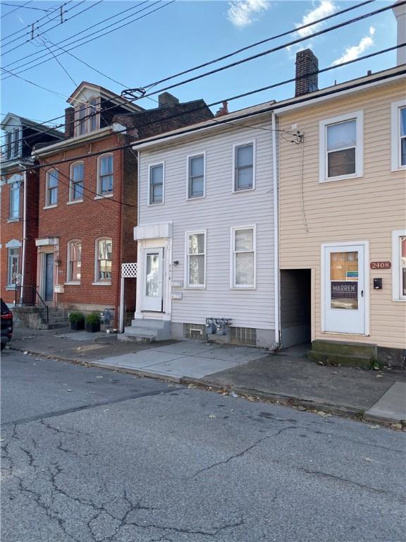 2410 Jane St, South Side, PA 15203 - view of property with entry steps and a chimney