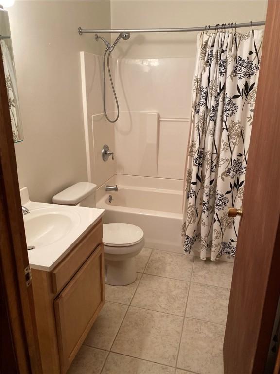 2410 Jane St, South Side, PA 15203 - full bath featuring shower / tub combo, toilet, tile patterned flooring, and vanity