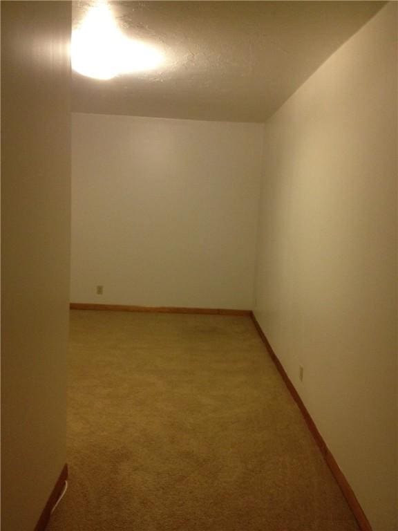 2410 Jane St, South Side, PA 15203 - unfurnished room featuring baseboards and light carpet