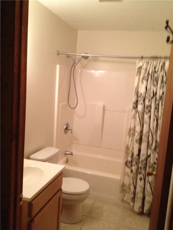 2410 Jane St, South Side, PA 15203 - bathroom featuring toilet, vanity, tile patterned flooring, and shower / tub combo with curtain