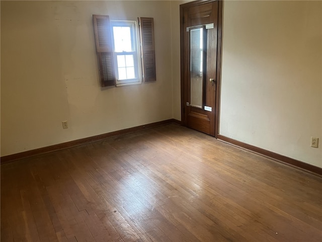 3841 Lawnview Ave, Brentwood, PA 15227 - spare room featuring baseboards and hardwood / wood-style floors