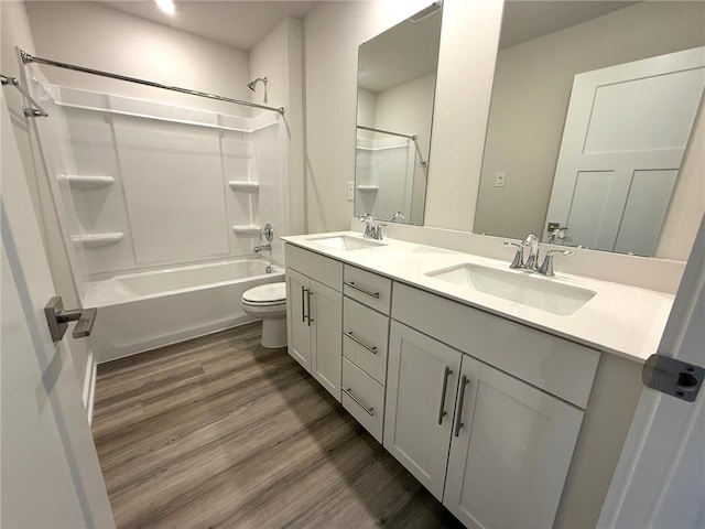 406 Barons Ct, Peters Twp, PA 15367 - bathroom featuring double vanity, shower / bathtub combination, toilet, and wood finished floors