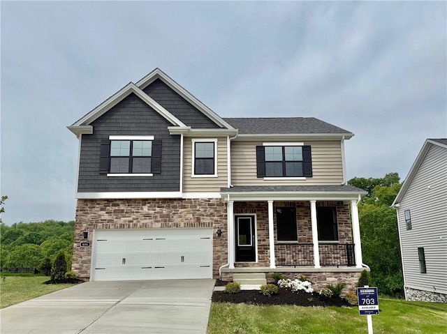 406 Barons Ct, Peters Twp, PA 15367 - craftsman-style home with covered porch, concrete driveway, stone siding, and an attached garage