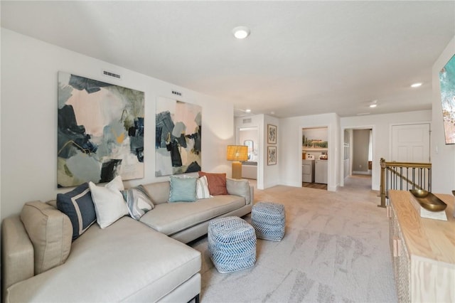 406 Barons Ct, Peters Twp, PA 15367 - living area featuring light colored carpet, separate washer and dryer, recessed lighting, and baseboards