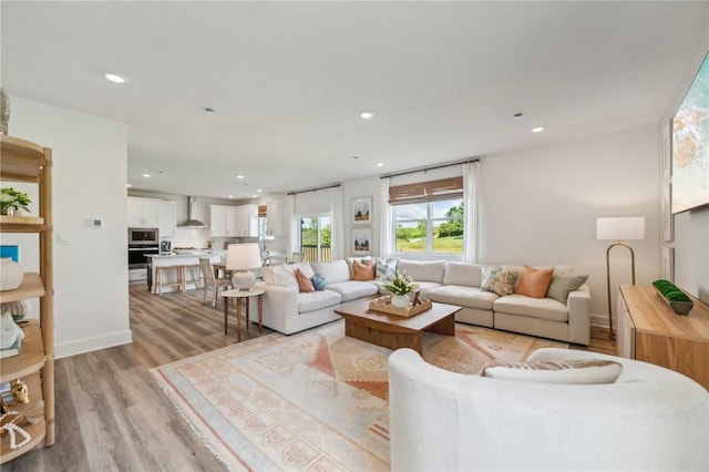 406 Barons Ct, Peters Twp, PA 15367 - living area featuring light wood finished floors, recessed lighting, and baseboards