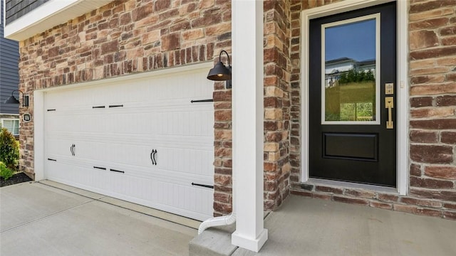 406 Barons Ct, Peters Twp, PA 15367 - entrance to property with brick siding, a garage, concrete driveway, and stone siding