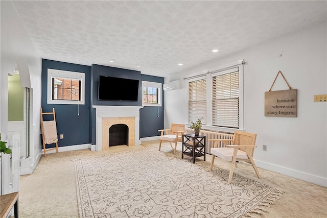living area featuring a fireplace, carpet flooring, a textured ceiling, and radiator
