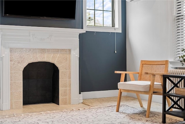 sitting room featuring a fireplace