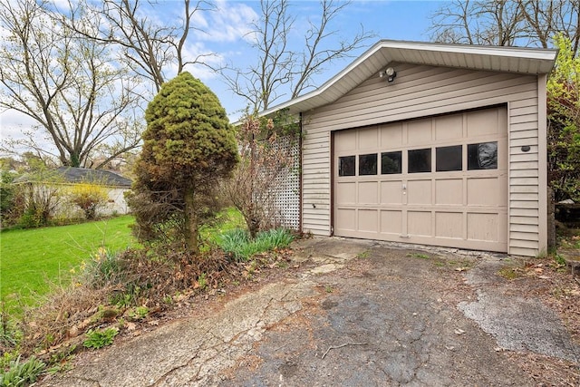 detached garage with aphalt driveway
