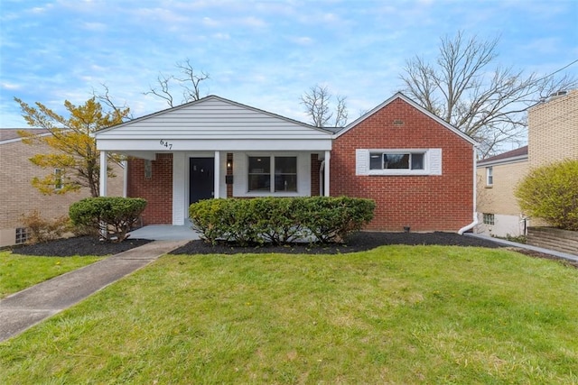 647 Northcrest Dr, Brookline, PA 15226 - bungalow-style house with brick siding, a front yard, and a porch