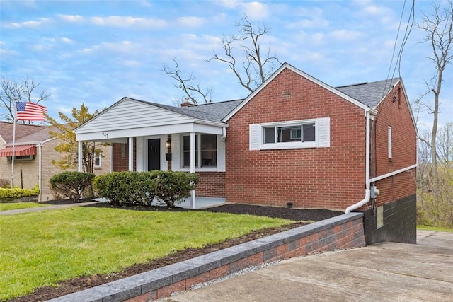 647 Northcrest Dr, Brookline, PA 15226 - view of front of house with brick siding, a front yard, covered porch, and roof with shingles