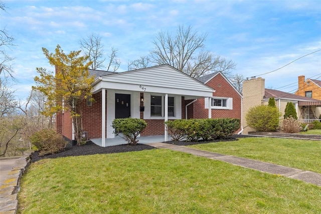 647 Northcrest Dr, Brookline, PA 15226 - bungalow-style house with a front yard, brick siding, and covered porch