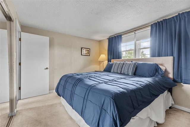 123 Summit Ridge Dr, South Fayette, PA 15017 - bedroom featuring carpet floors, baseboards, and a textured ceiling