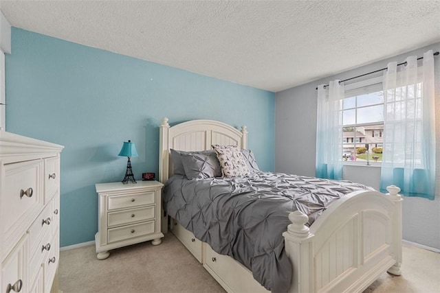 123 Summit Ridge Dr, South Fayette, PA 15017 - bedroom featuring light carpet, a textured ceiling, and baseboards