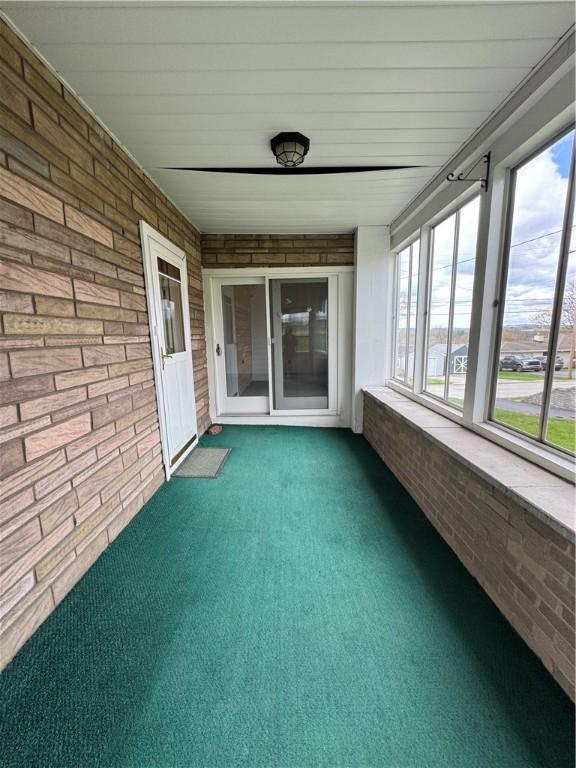 view of unfurnished sunroom