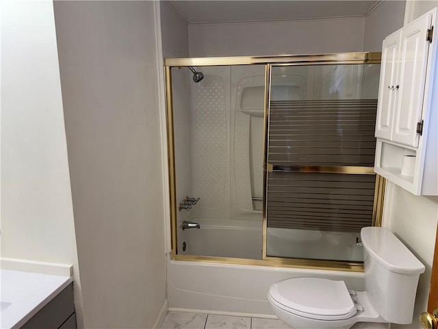 bathroom with toilet, vanity, baseboards, and enclosed tub / shower combo