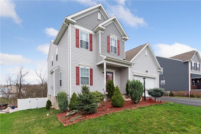 423 Labrador Ln, Jefferson Hills, PA 15025 - view of front of house featuring driveway, a front yard, and fence