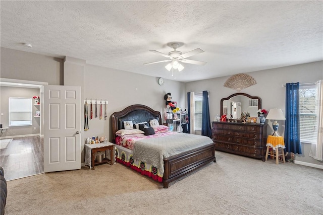 423 Labrador Ln, Jefferson Hills, PA 15025 - carpeted bedroom with a ceiling fan and a textured ceiling