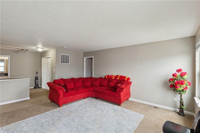 423 Labrador Ln, Jefferson Hills, PA 15025 - carpeted living area with baseboards and visible vents