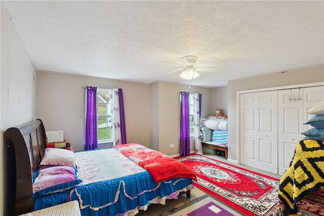 423 Labrador Ln, Jefferson Hills, PA 15025 - bedroom with a ceiling fan, a textured ceiling, and a closet