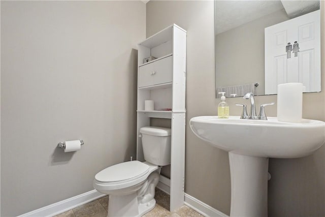 423 Labrador Ln, Jefferson Hills, PA 15025 - half bathroom featuring tile patterned floors, baseboards, and toilet