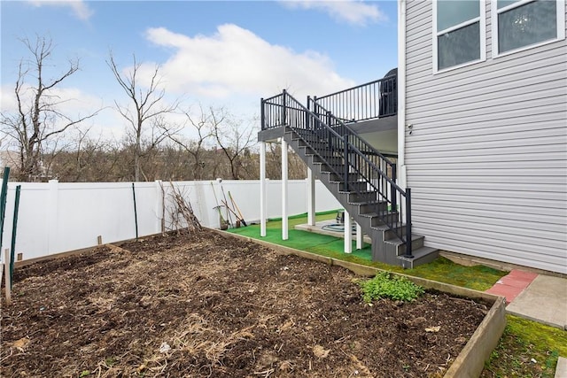 423 Labrador Ln, Jefferson Hills, PA 15025 - view of yard with a wooden deck, a fenced backyard, and stairway