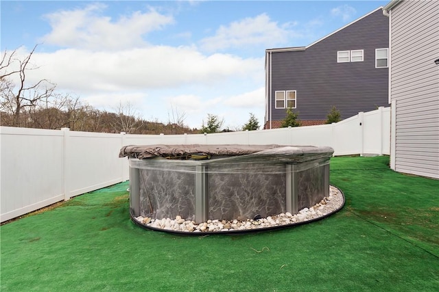423 Labrador Ln, Jefferson Hills, PA 15025 - view of yard with a fenced backyard and a hot tub
