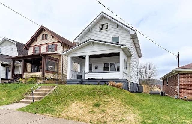 2017 Leishman, Arnold, PA 15068 - view of front of house with cooling unit, covered porch, and a front lawn