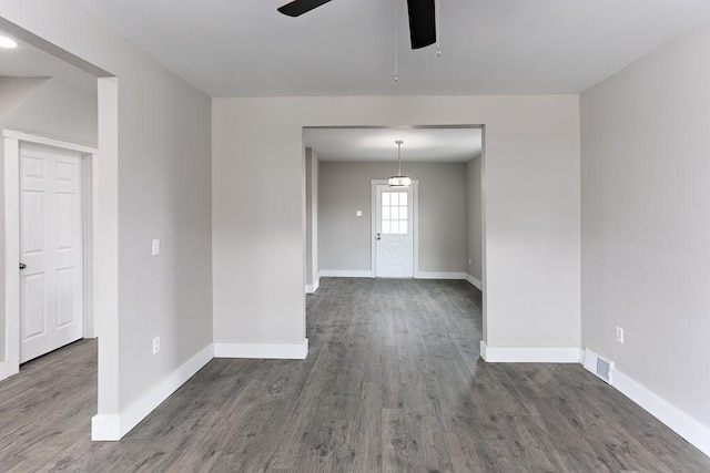 2017 Leishman, Arnold, PA 15068 - spare room featuring dark wood-type flooring, baseboards, and a ceiling fan