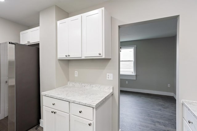 2017 Leishman, Arnold, PA 15068 - kitchen featuring freestanding refrigerator, white cabinets, wood finished floors, light countertops, and baseboards