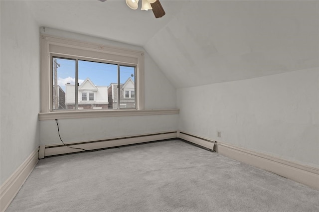 826 Collins Ave, Highland Park, PA 15206 - bonus room featuring baseboard heating, baseboards, a ceiling fan, lofted ceiling, and carpet
