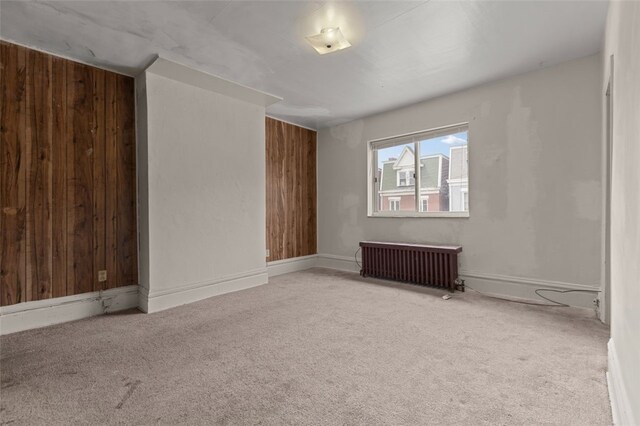 826 Collins Ave, Highland Park, PA 15206 - unfurnished room featuring radiator heating unit and carpet floors