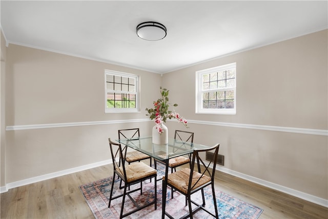2011 Woodward Ave, Brookline, PA 15226 - dining area featuring plenty of natural light, baseboards, ornamental molding, and wood finished floors