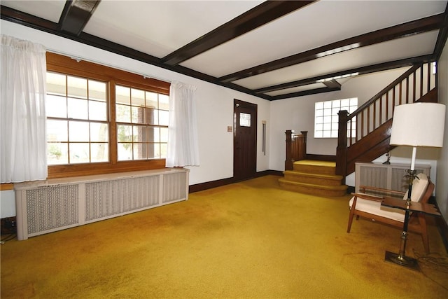 2714 Graham Blvd, Wilkinsburg, PA 15235 - carpeted foyer entrance with radiator heating unit, stairway, baseboards, and beam ceiling