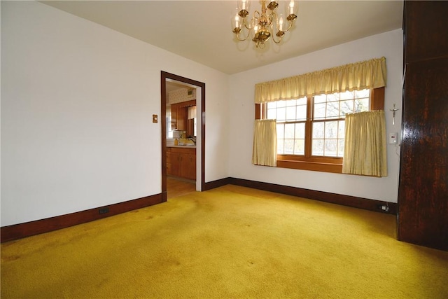 2714 Graham Blvd, Wilkinsburg, PA 15235 - empty room with baseboards, carpet flooring, and a notable chandelier