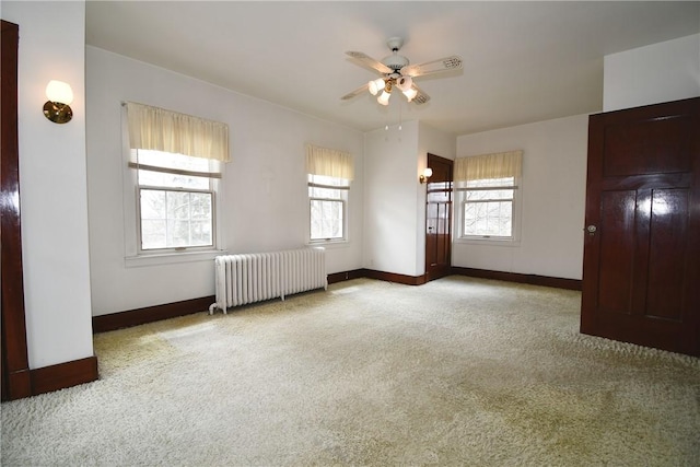 2714 Graham Blvd, Wilkinsburg, PA 15235 - unfurnished room with radiator, ceiling fan, baseboards, and carpet floors