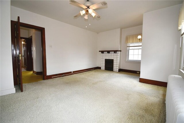 2714 Graham Blvd, Wilkinsburg, PA 15235 - unfurnished living room featuring carpet floors, baseboards, a ceiling fan, and radiator