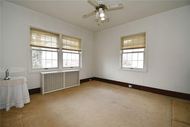 2714 Graham Blvd, Wilkinsburg, PA 15235 - spare room featuring carpet floors, radiator heating unit, ceiling fan, and baseboards