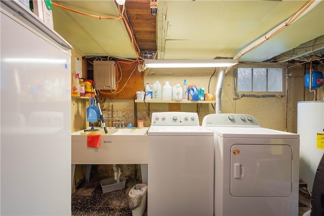 16 Fishpot Rd, Centerville, PA 15368 - washroom featuring water heater, separate washer and dryer, laundry area, and a sink