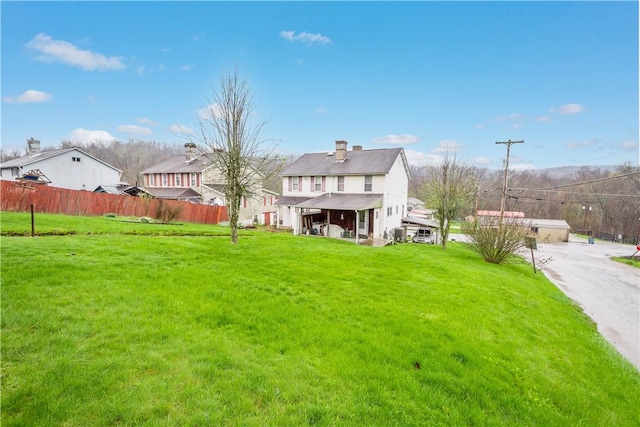 16 Fishpot Rd, Centerville, PA 15368 - back of property with fence and a lawn