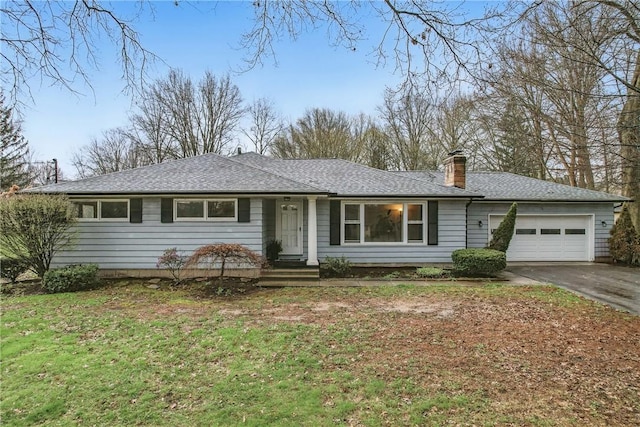 ranch-style house with a chimney, an attached garage, aphalt driveway, and a shingled roof