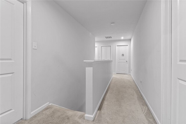 106 Morgan Dr, South Strabane, PA 15301 - corridor with light colored carpet, baseboards, an upstairs landing, and visible vents